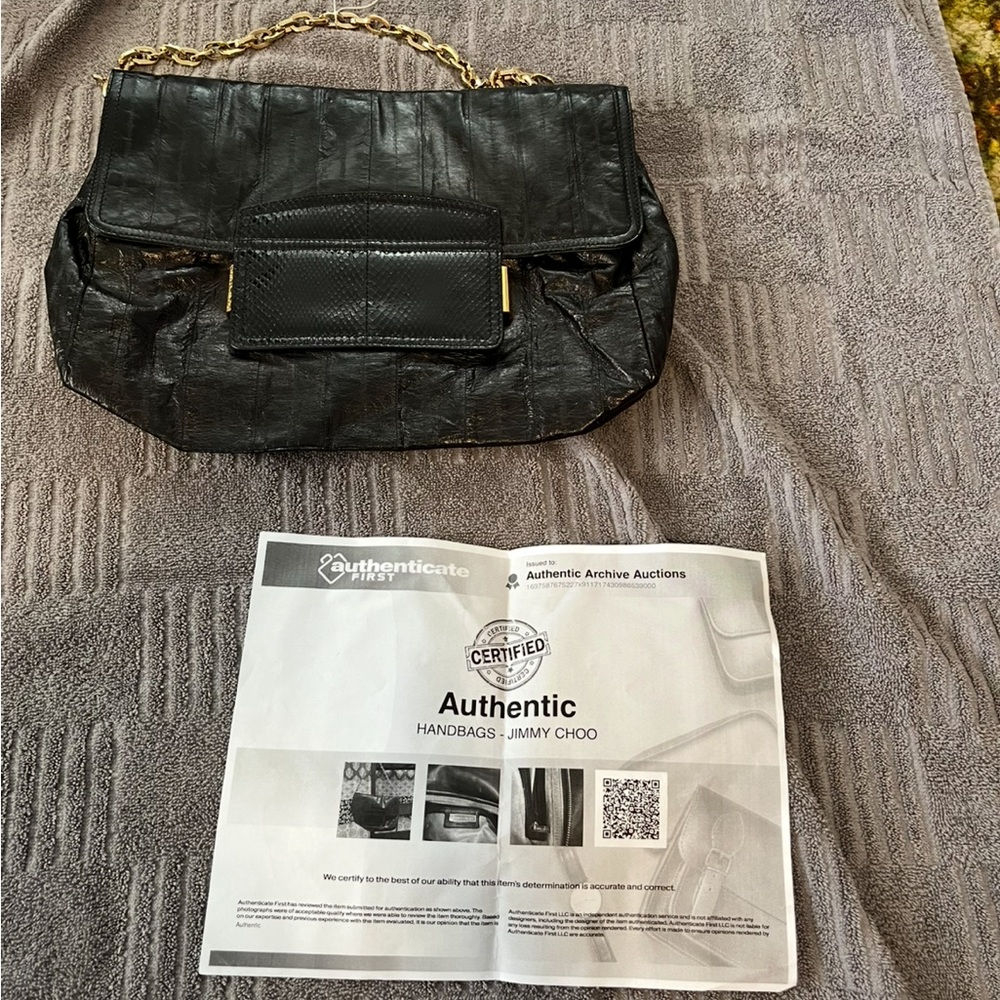 Jimmy Choo Black and Gold Shoulder Bag,, Glossy Finish with photo of COA.